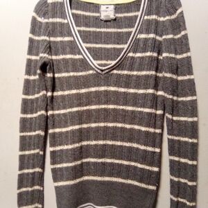 Poof excellence gray and white striped sweater. Size large.